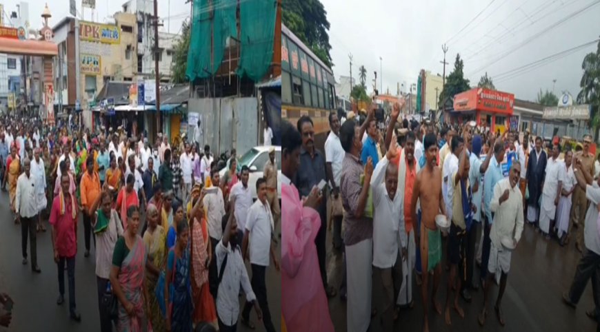 மழையில் நனைந்தபடி மக்கள் நலப்பணியாளர்கள் பேரணி