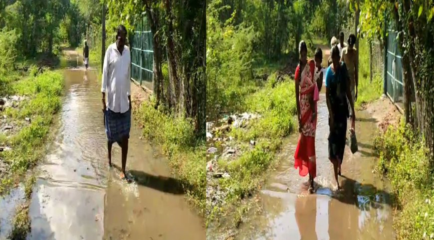 திருவாரூர் அருகே குடியிருப்பு பகுதியில் வடியாத மழைநீர்-சாலையை  வெட்டியபோது குடிநீர் குழாய் உடைந்ததால் மக்கள் அவதி